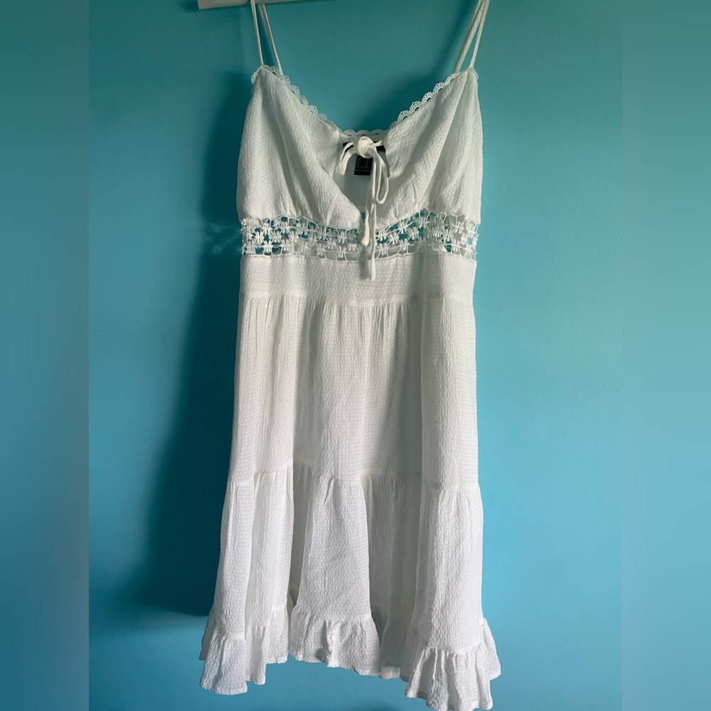 white flowy cut out flower dress